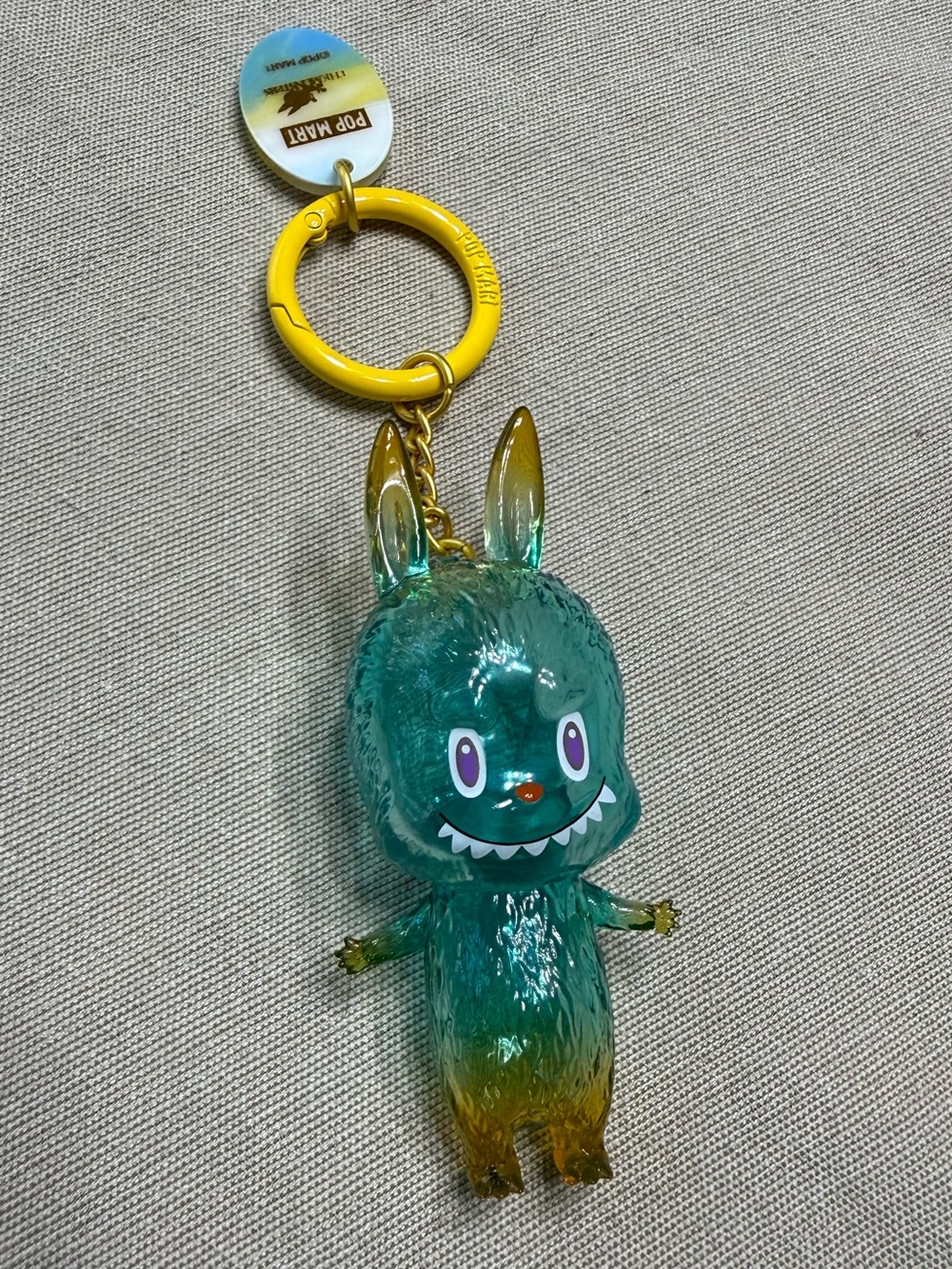 Pop Mart Labubu and Spooky Teal and Yellow Bunny Keychain Figure